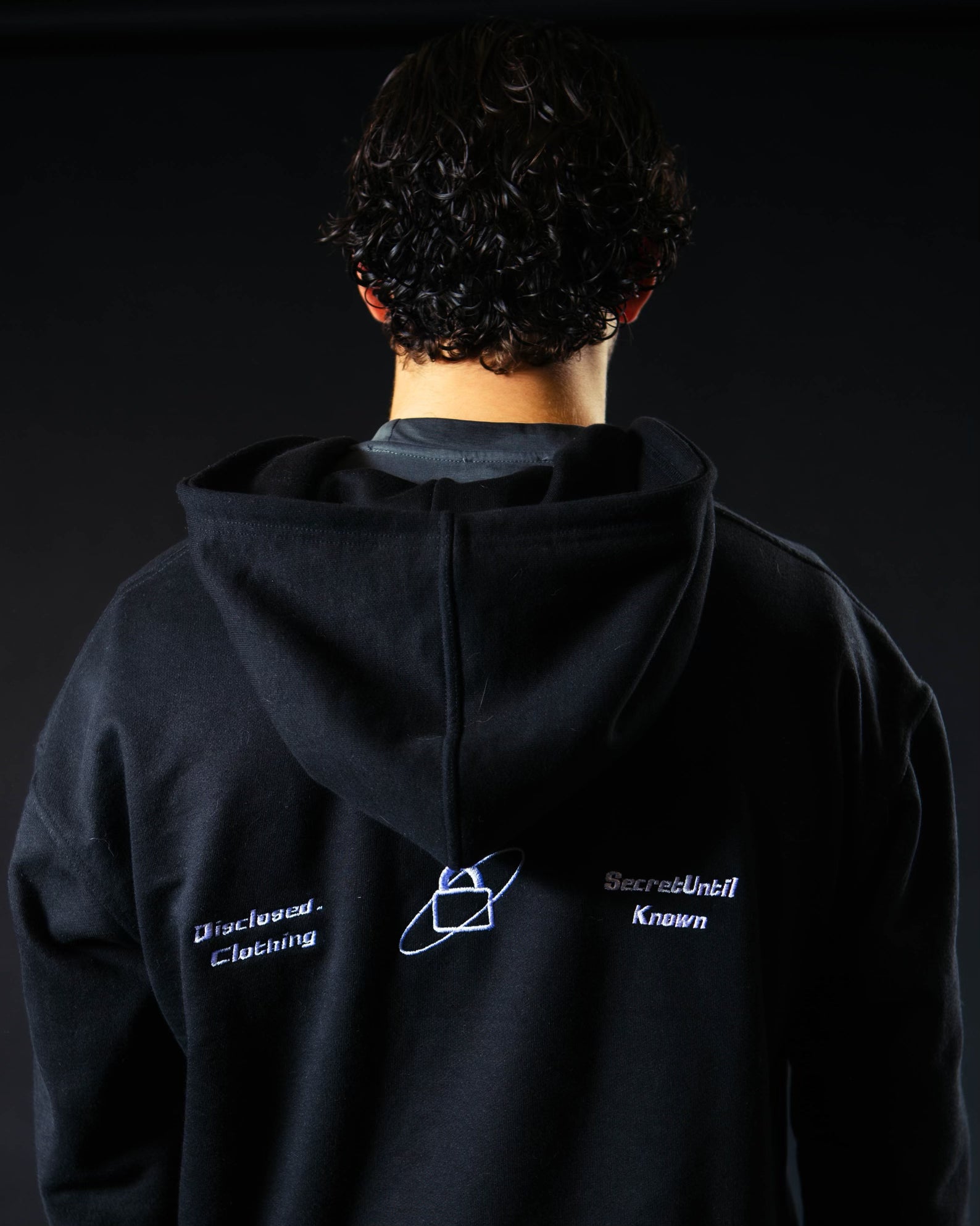 DISCLOSED ZIP UP